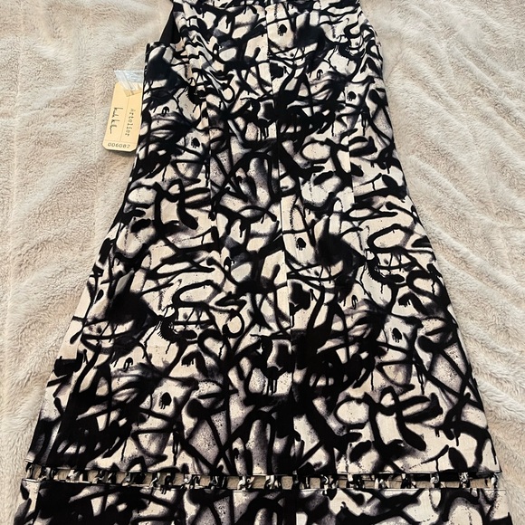 New! Nicole Miller Artelier black and white, lined cutout dress
NWT! Size 2 - Picture 9 of 11